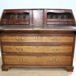 Unknown A Lovely George III Oak And Mahogany Cross Banded Bureau.