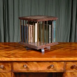 A Small Edwardian Oak And Brass Tabletop Revolving Bookcase C.1905