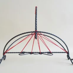 String Mid Century Wrought Iron And Red Cord Newspaper Rack -Storage Furniture Sales 2024 mid century wrought iron and red cord newspaper rack 0 9 scaled