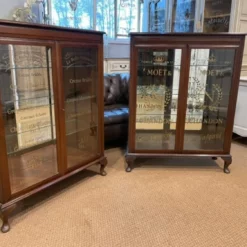 Vintage 1920s Matching Pair 2 Door Glazed Bookcase Cabinets 2 Door Display Cabinets With Later Lettering -Storage Furniture Sales 2024 vintage 1920s matching pair 2 door glazed bookcase cabinets 2 door display cabinets with later lettering sku43102440 0 2